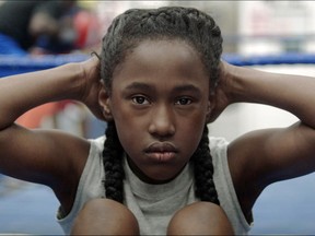 This image released by Oscilloscope shows Royalty Hightower in a scene from "The Fits," a film about an 11-year-old girl who learns about gender and identity through dance. (Oscilloscope  via AP)