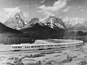 'The Canadian' train passing through the Canadian Rockies on its route from Montreal to Vancouver in 1955.