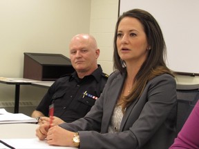 Lethbridge Police Insp. Tom Ascroft, left, and Jill Manning from ARCHES, hold a news conference on Thursday, June 22, 2017 in Lethbridge, Alta., to announce plans to apply for approval for a safe injection site. THE CANADIAN PRESS/Bill Graveland