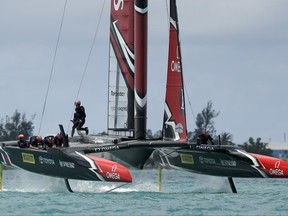 Emirates Team New Zealand helmsman Peter Burling crosses the boat in race nine against Oracle Team USA during America's Cup sailing competition Monday, June 26, 2017, in Hamilton, Bermuda. (AP Photo/Gregory Bull)