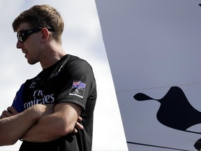 Emirates Team New Zealand Helmsman Peter Burling looks on before a Red Bull Youth America's Cup awards ceremony Wednesday, June 21, 2017, in Hamilton, Bermuda. Emirates Team New Zealand faces Oracle Team USA in more America's Cup sailing competition this weekend. (AP Photo/Gregory Bull)