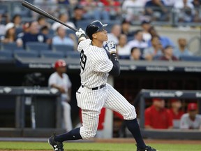 New York Yankees' Aaron Judge watches his three-run home run during the second inning of a baseball game against the Los Angeles Angels in New York, Thursday, June 22, 2017. (AP Photo/Kathy Willens)
