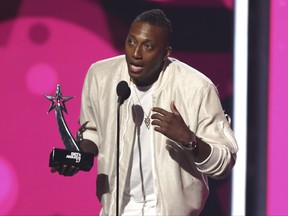 Lecrae accepts the Dr. Bobby Jones best gospel/inspirational award at the BET Awards at the Microsoft Theater on Sunday, June 25, 2017, in Los Angeles. (Photo by Matt Sayles/Invision/AP)