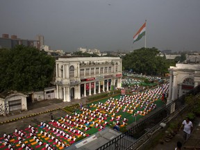 Indians perform Yoga to mark the International Yoga Day in New Delhi, India, Wednesday, June 21, 2017. Millions of yoga enthusiasts across India take part in a mass yoga sessions to mark the third International Yoga Day which falls on June 21 every year. (AP Photo/Manish Swarup)