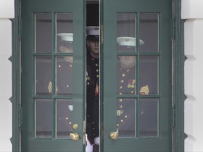 Marines open the door of the White House in Washington, Monday, June 19, 2017, in preparation of the arrival of Panamanian President Juan Carlos Varela to meet with President Donald Trump. (AP Photo/Susan Walsh)