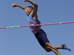 Trey Hardee clears the bar in the men's decathlon pole vault at the U.S. Track and Field Championships, Friday, June 23, 2017, in Sacramento, Calif. (AP Photo/Rich Pedroncelli)