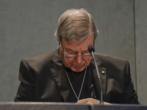 Cardinal George Pell meets the media, at the Vatican, Thursday, June 29, 2017. The Catholic Archdiocese of Sydney says Vatican Cardinal George Pell will return to Australia to fight sexual assault charges as soon as possible. (AP Photo/Gregorio Borgia)
