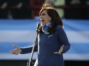 Argentina's former President Cristina Fernandez speaks during a rally on the outskirts of Buenos Aires, Argentina, Tuesday, June 20, 2017. Fernandez appeared before thousands of followers to launch the new political front Unidad Ciudadana or Citizens Unity Party, to challenge President Mauricio Macri's ruling party in the upcoming October mid-term election. (AP Photo/Victor R. Caivano)