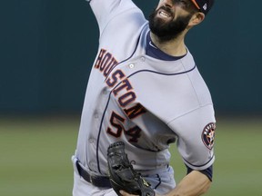 Houston Astros pitcher Mike Fiers works against the Oakland Athletics during the first inning of a baseball game Wednesday, June 21, 2017, in Oakland, Calif. (AP Photo/Ben Margot)