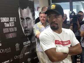 Manny Pacquiao speaks to the media in Brisbane, Tuesday, June 27, 2017. Pacquiao, is putting his WBO belt on the line Sunday, July 2, against the 29-year-old Australian fighter Jeff Horn. (AP Photo/John Pye)