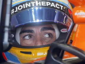 McLaren's Formula One driver Fernando Alonso of Spain enters the pitlane during the first practice session at the F1 Grand Prix circuit in Baku, Azerbaijan, Friday, June 23, 2017. The Formula One Grand Prix of Europe will be held on Sunday. (AP Photo/Efrem Lukatsky)