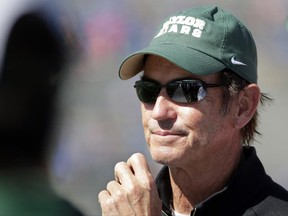In this Oct. 10, 2015, file photo, Baylor head coach Art Briles watches during the second half of an NCAA college football game against Kansas.