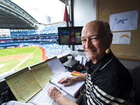 Toronto Blue Jays broadcaster Jerry Howarth overlooks the field from his broadcast booth on June 17.