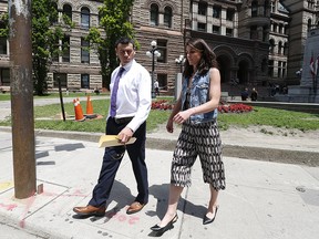 Ken Pagan, of Hamilton, who throw a can of beer onto the outfield during a Toronto Blue Jays - Baltimore Orioles playoff game was given a conditional discharge. He leaves Old City Hall court in Toronto with his girlfriend. Pagan has a year ban from all MLB stadiums and must do 100 hours community service. on Wednesday June 28, 2017.