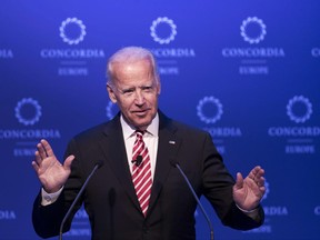 Former U.S. Vice President Joe Biden speaks during a conference in Athens. Biden, who addressed gay rights Wednesday, June 21, at a private LGBT gala hosted by the Democratic National Committee in New York, said, "Hold President Trump accountable for his pledge to be your friend."