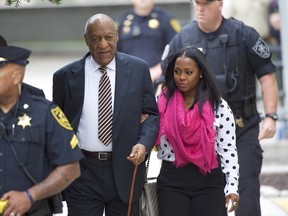 Bill Cosby arrives with actress Keshia Knight Pulliam at the Montgomery County Courthouse before the opening of the sexual assault trail June 5, 2017 in Norristown, Pennsylvania.