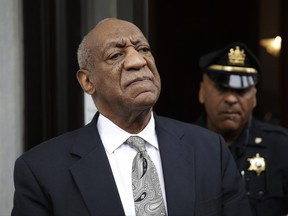 Bill Cosby exits the Montgomery County Courthouse after a mistrial was declared in his sexual assault trial in Norristown, Pa