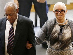 Bill Cosby and Cosby's wife, Camille Cosby, right, enter the Montgomery County Courthouse for Bill Cosby's sexual assault trial in Norristown, Pa., on Monday, June 12, 2017