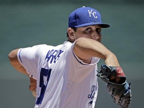 Kansas City Royals starting pitcher Jason Vargas throws during the first inning of a baseball game against the Toronto Blue Jays Saturday, June 24, 2017, in Kansas City, Mo. (AP Photo/Charlie Riedel)