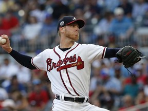 Atlanta Braves starting pitcher Mike Foltynewicz works in the first inning of the team's baseball game against the Milwaukee Brewers on Friday, June 23, 2017, in Atlanta. (AP Photo/John Bazemore)