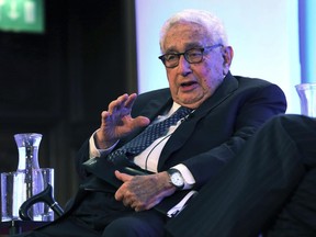 Former U.S. Secretary of State Henry Kissinger gestures as he delivers the keynote address at the 2017 Margaret Thatcher conference on Security, in London, Tuesday June 27, 2017. Kissinger on Tuesday warned of Russia's simmering alienation from its western neighbors but said he believed that President Vladimir Putin will ultimately work toward cooperative relationships with countries on its borders. (AP Photo/Leonore Schick)