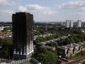The remains of Grenfell Tower stand in London, Saturday, June 17, 2017.