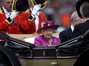 Queen Elizabeth II arrives during during day five of Royal Ascot at Ascot Racecourse, England. Saturday June 24, 2017. (John Walton/PA via AP)