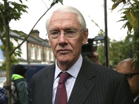 Retired Court of Appeal judge Martin Moore-Bick leaves St Clement's Church near to the Grenfell Tower apartment building in London, Thursday June 29, 2017.  British Prime Minister Theresa May has appointed Martin Moore-Bick on Thursday to chair a public inquiry into the deadly west London fire on June 14, that killed some dozens of people. (Philip Toscano/PA via AP)
