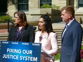 (L-R) Wildrose shadow Justice Minister Angela Pitt, Wildrose leader Brian Jean and Wildrose shadow Status of Women Minister Leela Aheer are shown at a press conference at McDougall Centre in Calgary, Alta. on Friday June 23, 2017. The Wildrose party released recommendations to improve sexual assault and evidence collection policy in Alberta