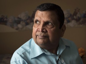 Mike Mehta sits for a portrait in his home in Kitchener, Ontario on Friday, June23, 2017. Mehta came to Canada as a refugee from Uganda in 1972 after the country's president ordered an expulsion of Asian minorities. Mehta says he chose the best country to come to. THE CANADIAN PRESS/Hannah Yoon