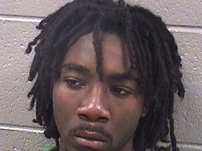 This undated photo provided by the Cook County Sheriff's Department shows Raekwon Hudson. Hudson and two juveniles are charged with attempted murder and aggravated battery with a firearm in the shooting at a elementary school playground that left young two children with bullet wounds Friday, June 16, 2017, in Chicago. A visibly angry judge ordered Hudson held in jail without bond during a hearing Sunday, June 18, 2017. (Cook County Sheriff's Department via AP)