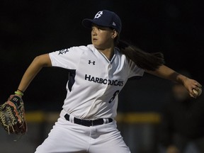 Claire Eccles throws a pitch while playing for the Victoria HarbourCats of the West Coast League, a collegiate summer baseball league, during a game against the Wenatchee AppleSox at Royal Athletic Park in Victoria on June, 7, 2017.