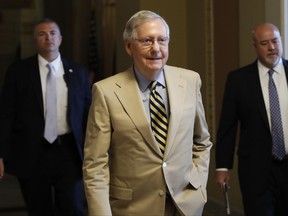 Senate Majority Leader Mitch McConnell of Ky. walks from his office on Capitol Hill in Washington, Monday, June 26, 2017. Senate Republicans unveil a revised health care bill in hopes of securing support from wavering GOP lawmakers, including one who calls the drive to whip his party's bill through the Senate this week "a little offensive."