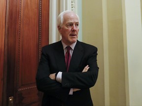 Senate Majority Whip John Cornyn of Texas, pauses as he speaks to reporters outside his office on Capitol Hill in Washington, Monday, June 26, 2017. Several Senate Republicans could scuttle the party's latest proposal to reform the American health care system.