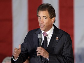 FILE – In this Sept. 29, 2014, file photo, Rep. Jim Renacci, R-Ohio, speaks in Independence, Ohio. Churches should have the First Amendment right to endorse political candidates and still keep their tax-free status, say House Republicans, who quietly tucked a provision into a sweeping spending bill that would deny the IRS money to enforce the 63-year-old law prohibiting such outright politicking from the pulpit.  (AP Photo/Mark Duncan, File)