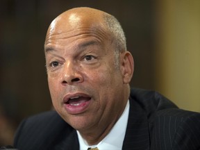 FILE - In this July 14, 2016, file photo, then-Homeland Security Secretary Jeh Johnson testifies on Capitol Hill in Washington.  Johnson faces questions on june 21, 2017, about Russia's meddling in the 2016 presidential election as the House intelligence committee presses ahead with its investigation. Its Senate counterpart raises the same issues with current FBI, homeland security and state election officials. (AP Photo/Evan Vucci, File)