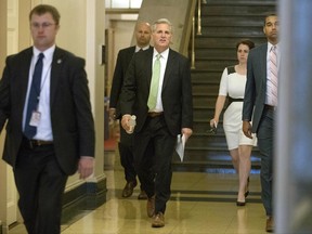 House Majority Leader Kevin McCarthy of Calif., center, arrives for a GOP caucus meeting on Capitol Hill, Wednesday, June 21, 2017, in Washington. (AP Photo/Andrew Harnik)