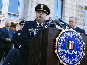 United States Capitol Police Chief Matthew Verderosa, with Federal Bureau of Investigation Washington Field Office, Special Agent in Charge Timothy Slater, back right, speaks to reporters outside the FBI Washington Field Office, Wednesday, June 21, 2017 in Washington, during a news conference about the investigative findings to date in the shooting that occurred at Eugene Simpson Stadium Park in Alexandria, Va. on Wednesday, June 14, 2017. (AP Photo/Manuel Balce Ceneta)