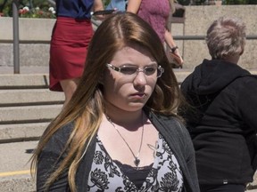 Cheyenne Dunbar leaves the trial of Derek Saretzky, charged with three counts of first-degree murder, in Lethbridge, Alta., Wednesday, June 21, 2017.