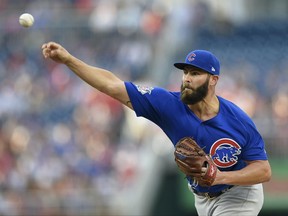 Chicago Cubs starting pitcher Jake Arrieta delivers a pitch during the first inning of a baseball game against the Washington Nationals, Tuesday, June 27, 2017, in Washington. (AP Photo/Nick Wass)