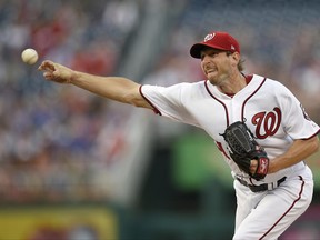 Washington Nationals starting pitcher Max Scherzer delivers a pitch during the first inning of a baseball game against the Chicago Cubs, Tuesday, June 27, 2017, in Washington.