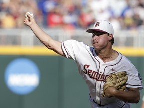 Florida State pitcher Cole Sands throws against LSU during the first inning of an NCAA College World Series baseball game in Omaha, Neb., Wednesday, June 21, 2017. (AP Photo/Nati Harnik)