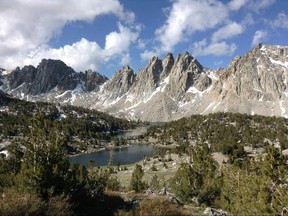 In this early June 2015 photo taken along the Pacific Crest Trail near Kearsarge Lakes in Kings Canyon National Park shows what conditions were when there was little snow on the trail.  Hikers on the Pacific Crest Trail, on America's West Coast, have been detouring California's high Sierra in droves this year because of persistent snow and raging creeks. Several hikers have had close calls while attempting to cover the scenic trail that runs from Mexico to Canada. (Brien Bower via AP)