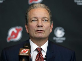 FILE -  In this Tuesday, June 2, 2015 file photo, New Jersey Devils general manager Ray Shero speaks during a NHL hockey news conference introducing John Hynes as the team's new head coach in Newark, N.J. If anyone needs the No. 1 pick in the NHL Draft, it's the New Jersey Devils. After making the playoffs for 20 of 22 seasons, the Devils have fallen on hard times. They have missed the postseason for the last five seasons and they are coming off their worst season in nearly three decades.(AP Photo/Julio Cortez, File)