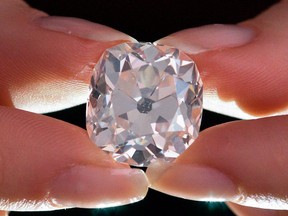 The 26.27 carat white diamond was auctioned by Sotheby’s in London.