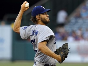 Los Angeles Dodgers starting pitcher Clayton Kershaw throws during the first inning of the team's baseball game against the Los Angeles Angels in Anaheim, Calif., Thursday, June 29, 2017. (AP Photo/Alex Gallardo)