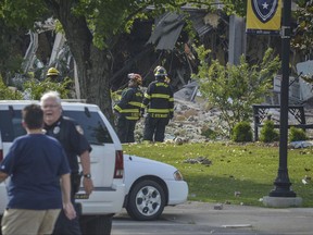 Emergency personnel respond to new Richmond Hall on the Murray State University campus after an explosion occurred, Wednesday, June 28, 2017. Officials say a blast at an unused Kentucky dormitory has caused extensive damage, with one employee hospitalized with injuries. Calloway County Emergency Management Director Bill Call told media outlets that the explosion at Murray State University was believed to have been caused by a natural gas leak.  (Edward Marlowe/The Paducah Sun via AP)