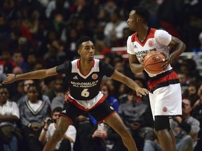 FILE - In this March 30, 2016, file photo, East guard Terrance Ferguson, left, guards West guard Joshua Langford during the McDonald's All-American boys basketball game in Chicago. The Oklahoma City Thunder selected Ferguson with the 21st pick in the NBA draft Thursday, June 22, 2017. (AP Photo/Matt Marton, File)
