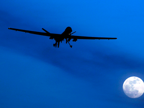 A U.S. Predator drone flies above Kandahar Airfield in 2010.