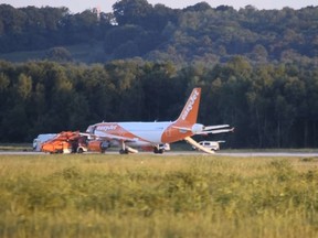 In this June 10, 2017 photo taken from video, a diverted EasyJet plane stands at Cologne-Bonn airport in Germany.